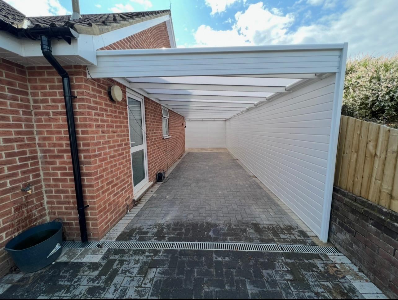 White side access canopy with privacy screening and translucent roof